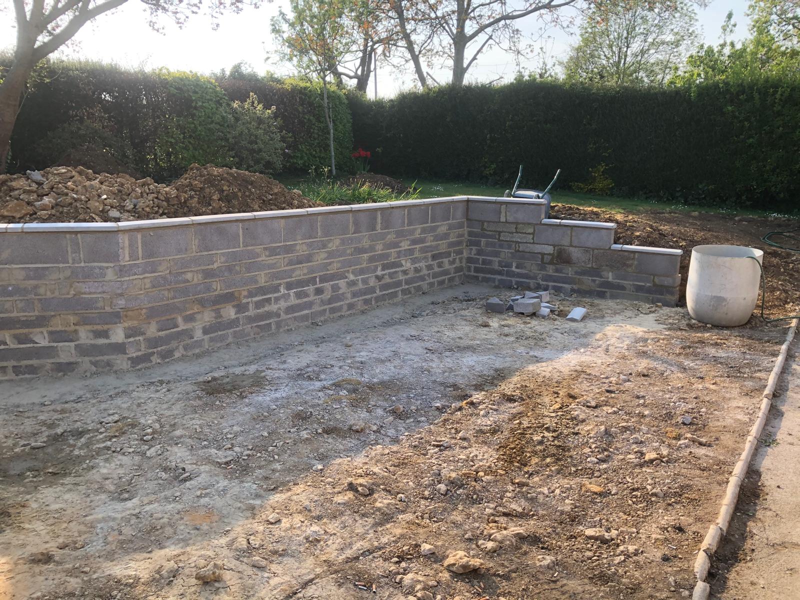Retaining wall construction by JB Outdoor Services in Somerset